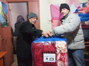 Distribuzione di coperte ai profughi in Libano, Caroline Gluck/Oxfam