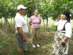 Prend in the grape yard with his mother (opposite) and our project manager, Margherita Cuni Prend in the grape yard with his mother (opposite) and our project manager, Margherita Cuni