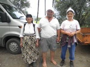 Prend with his wife and his mother in front of the house Prend with his wife and his mother in front of the house
