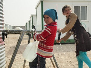 Giordania, raccolta dell'acqua al campo di Zaatari. Credits: Oxfam