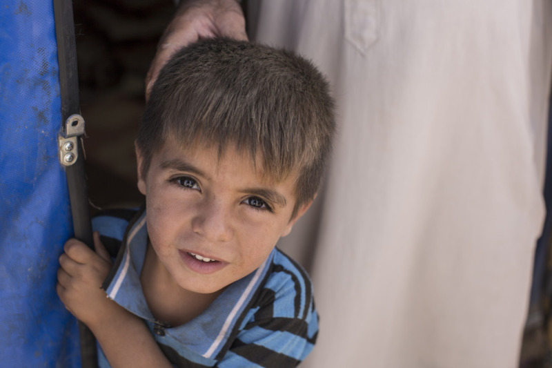Qasm ha 4 anni. Ha trovato rifugio nel campo per sfollati nel villaggio di Tinah, a Sud di Mosul.