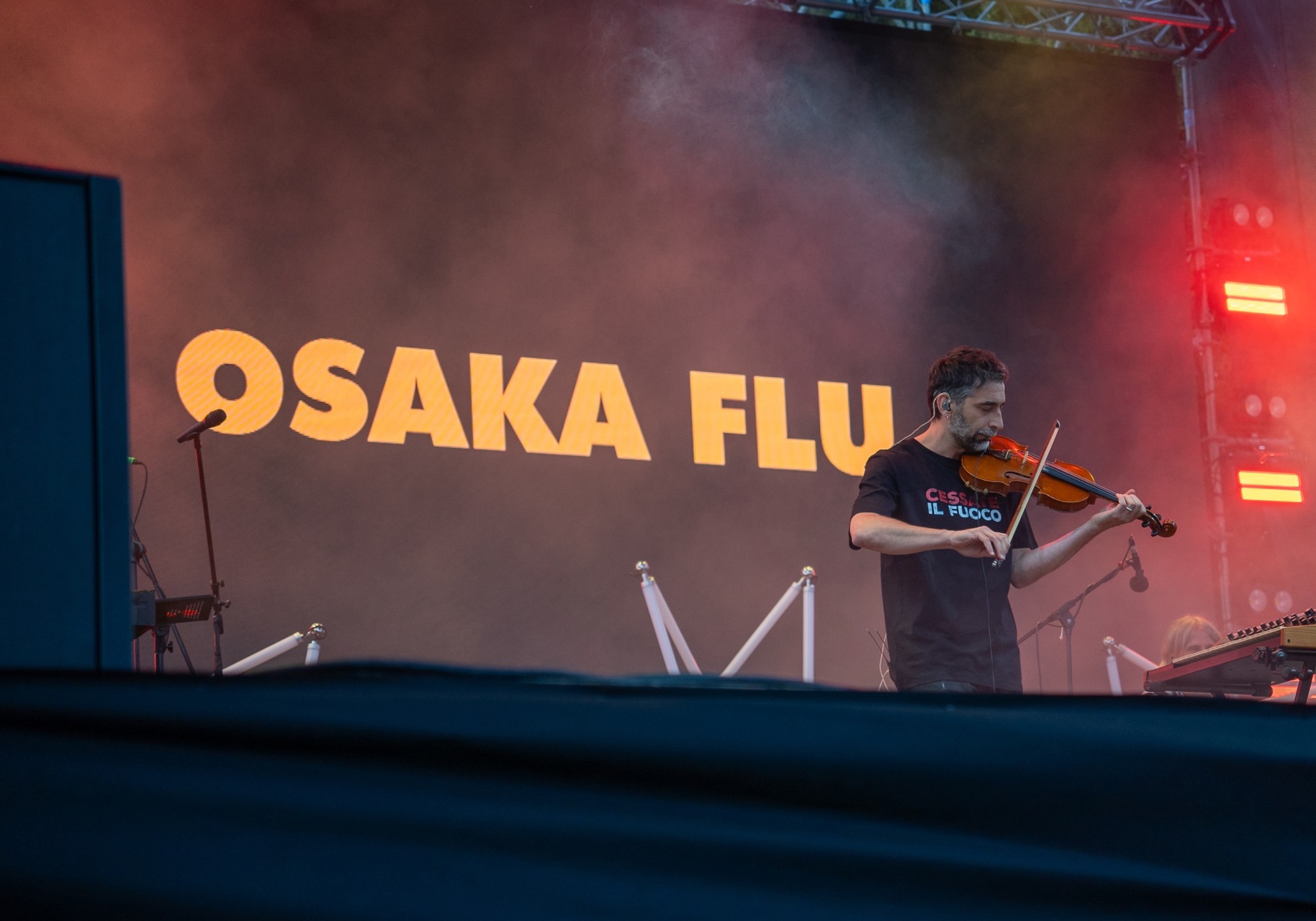 Gli Osaka Flu hanno scelto di far risuonare l’appello per il cessate il fuoco dal palco del festival. Credit: Michela Rizzotti / Oxfam